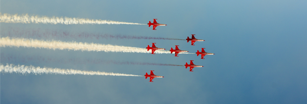 Planes in the sky in formation.